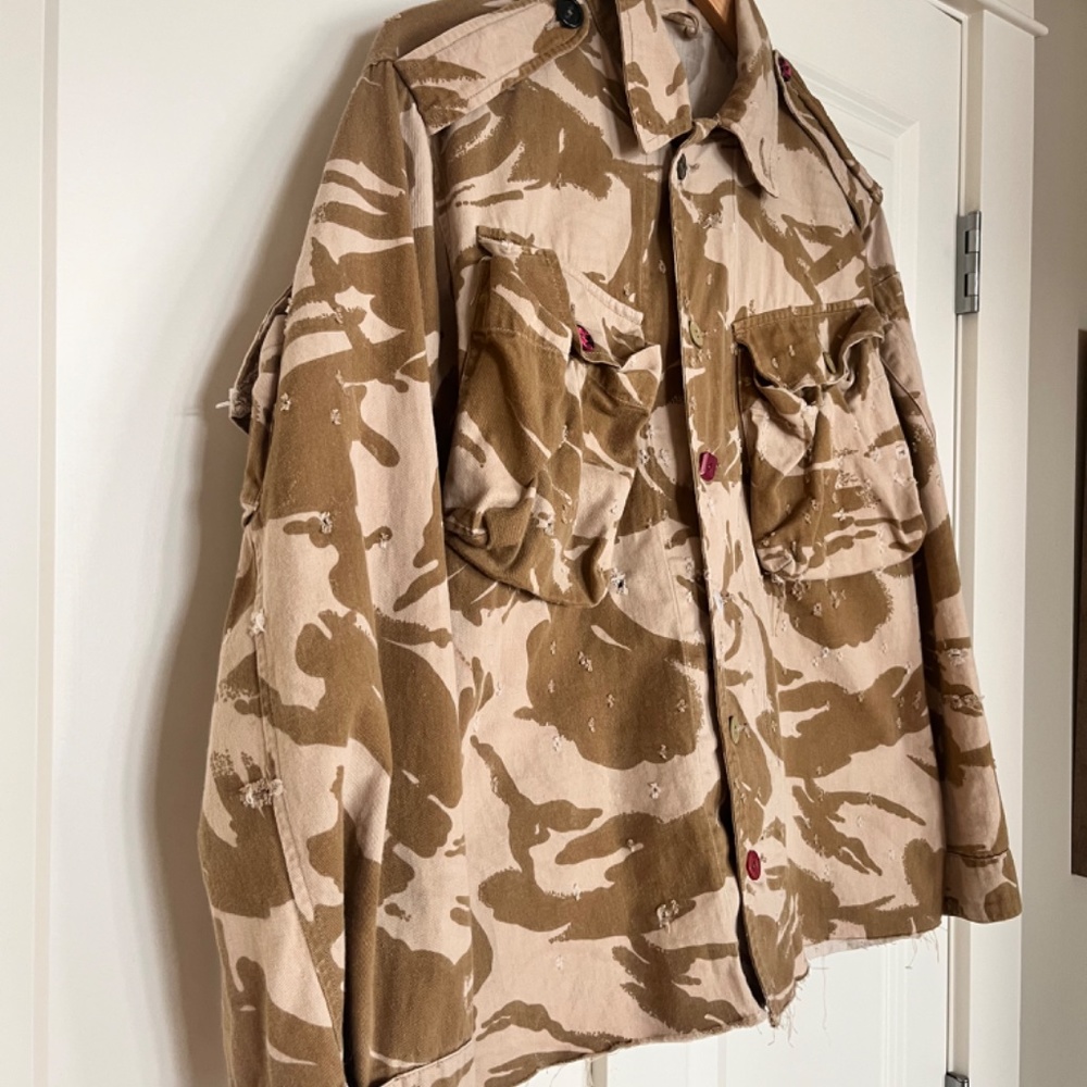 Camo jean jacket with ragged edges